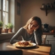 femme devant plat de pâtes TCA trop manger hypnose perte de poids crise d'hyperphagie